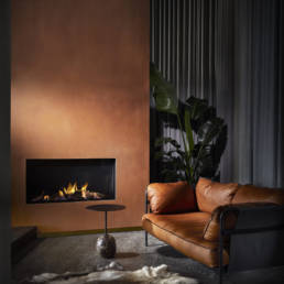 Ortal Front Facing fireplace with beige, coloured background